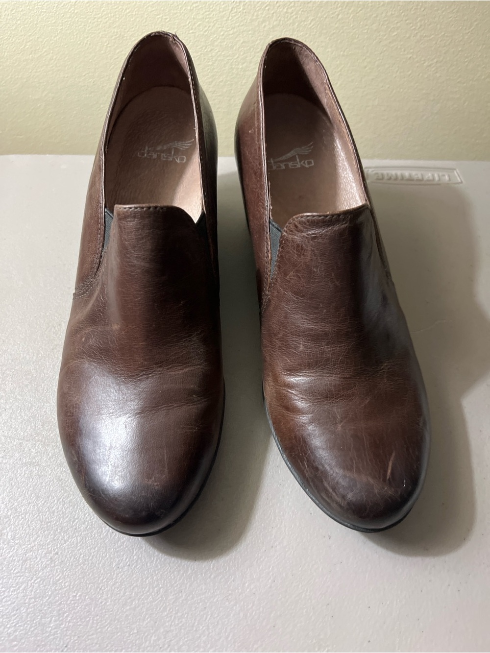 Dansko woman’s Brown Leather Slip-On Shoes
